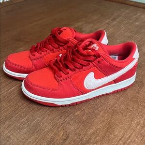 Red and Pink Nike Dunk Sneakers